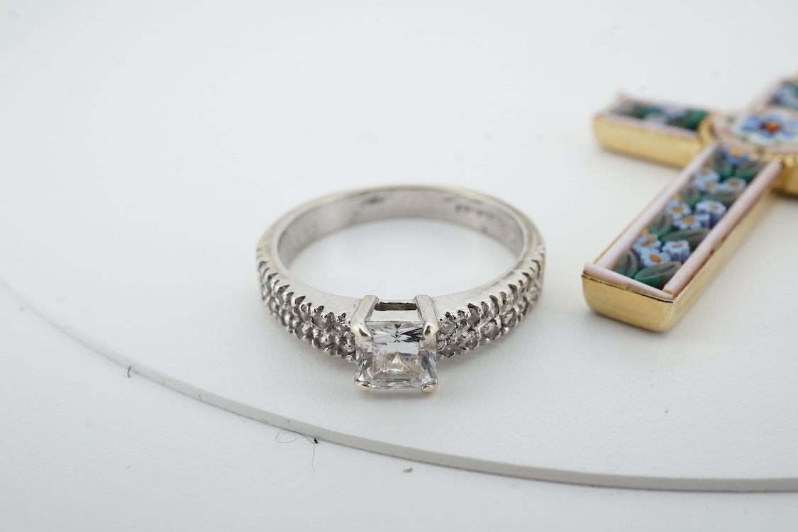Two modern 9ct gold and cubic zirconia set rings, including white gold, two other simulated diamond set rings, together with an Italian cross pendant, a cameo brooch and an oval gilt metal locket.